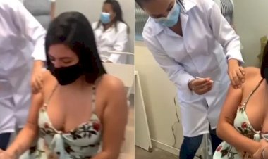 Enfermeira abraça jovem com medo de agulha de vacina: vídeo